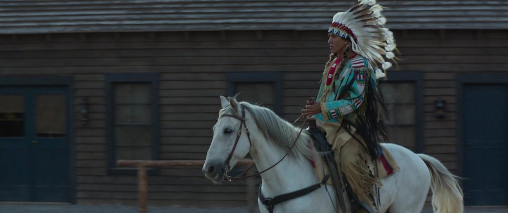 Sitting Bull in Woman walks ahead